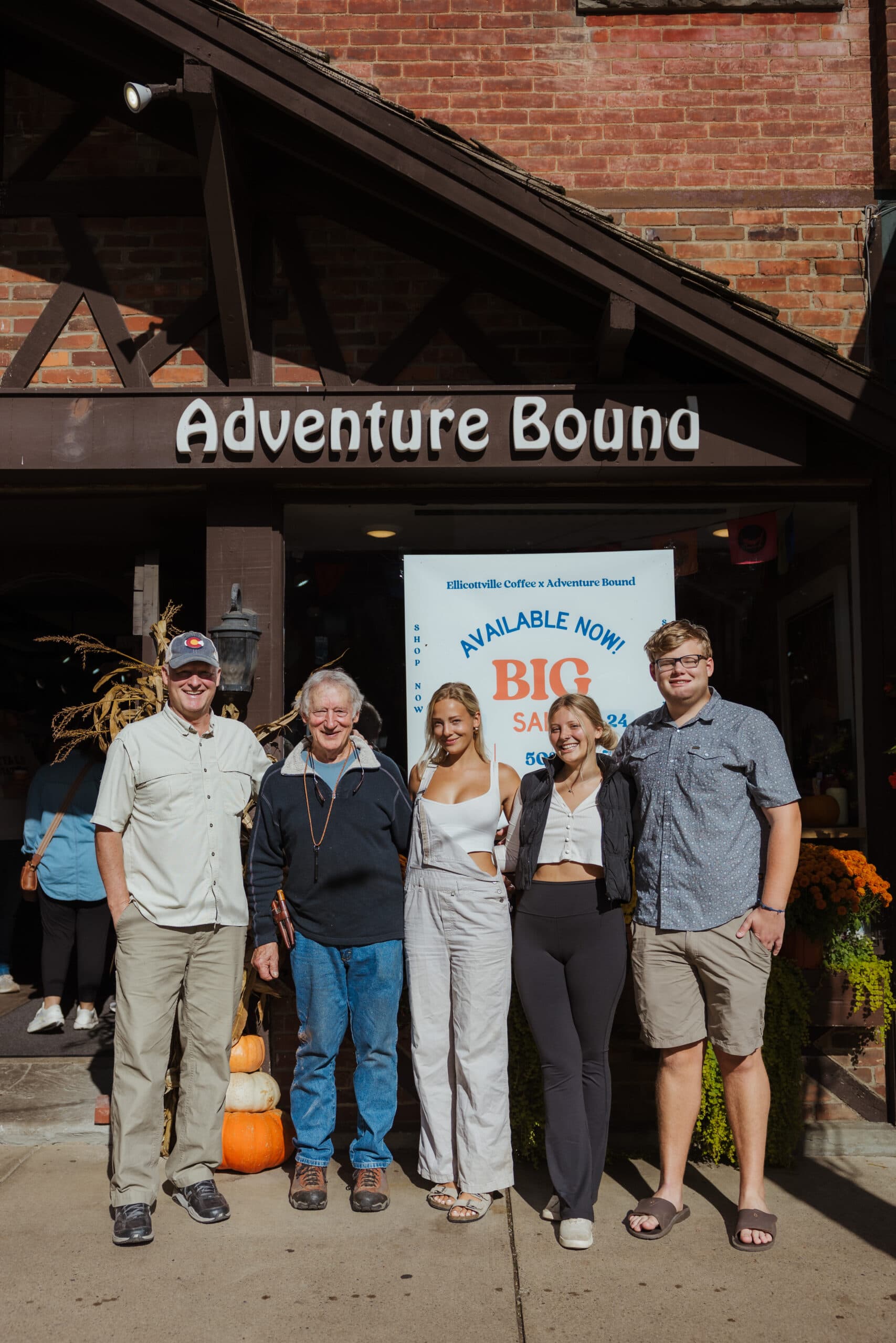 Three generations of family outside the Adventure Bound storefront in Ellicottville, New York